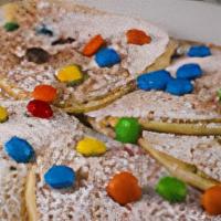 M&M Pancakes · Three(3) Buttermilk pancakes filled with M&M's and topped with more M&M's, powdered sugar an...