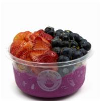 Dragonberry- Pitaya Bowl* · Pitaya blend topped with blueberry flax granola, strawberry, blueberry,  and honey.