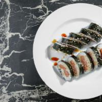 Musubi (2 Bar) · A sliced of grilled spam wrapped in rice and seaweed, drizzled with unagi sauce.