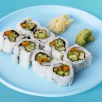 Carrot Avocado Roll · Shredded carrots and avocado with rice wrapped in nori.