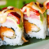 Marilyn Monroll · Shrimp tempura and masago rolled uramaki style, wrapped with tuna, avocado and sliced strawb...