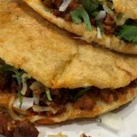 Gordita De Ground Beef (Halal) · hand made tortilla filled w/ your favorit meat raw onion cilantro fresh cheese , beans, sals...