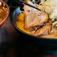The Fire Ramen · Favorite. Spicy. Fire spicy, chicken and beef broth. Your choice of chicken or pork chashu, ...