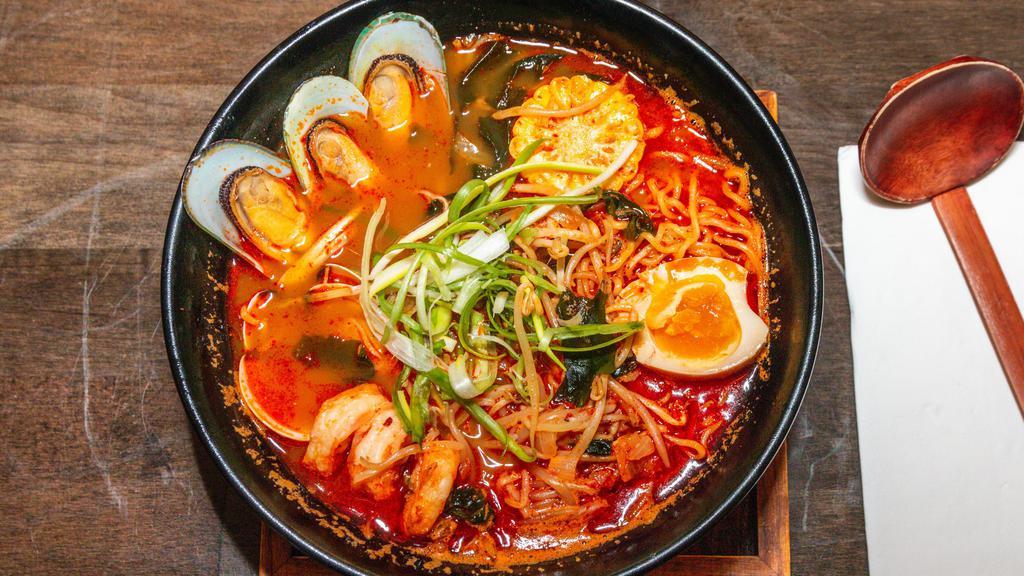 Seafood Ramen · Spicy. Has fish and vegetable broth, shrimp, scallops, mussels, octopus, scallions, onions, bean sprouts, ajitama egg, and corn.
