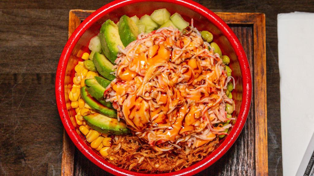 California Poke Bowl · Spicy krab (kani) salad, avocado, cucumber, edamame, corn, crispy onion, spicy mayo and teriyaki sauce.