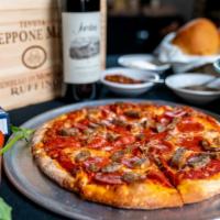 Campagina Pizza · Pepperoni, sausage and mozzarella cheese.