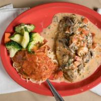 Red Snapper · Lightly blackened topped with tomato, shrimp and lemon butter sauce served with pasta and ve...