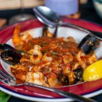 Pescotore Di Mare · Shrimp, scallops, and calamari served tossed in marinara sauce and pasta, chicken and veal.