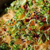 Ds Sesame Rice Noodles · chili vinaigrette, black sesame, green onion. **sesame, garlic, soy, onion