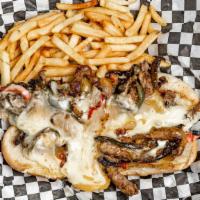 Philly Cheese Steak · grilled ribeye red & green peppers, and onions, smothered in Gouda & American Cheese.