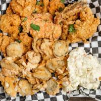 Deep-Fried Lobster Tail And Shrimp · Freshly breaded lobster tail & jumbo shrimp, marinated in house sauce, and deep-fried to a g...
