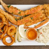 Deep-Fried Crab Legs · Freshly breaded crab legs, marinated, and deep-fried to a golden perfection.