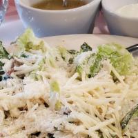 Gloria'S Salad · Bleu cheese crumbles, shredded mozzarella cheese, sliced mushrooms, onions, bacon bits, and ...