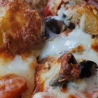 Margherita Pizza · Fresh mozzarella cheese, fresh basil, and fresh tomato.