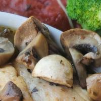 Chicken Marsala · Chicken sautéed with mushrooms, Italian seasonings, and dry marsala wine. Served with vegeta...