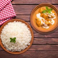 Creamy Butter Chicken Rice Bowl · A well flavoured and mildly spiced cooked chicken in tandoor and simmered in silky tomato gr...