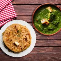 Spinach Cottage Cheese & Paratha · A flavourful yet spicy spinach curry with fresh chunks of cottage cheese, served with parath...