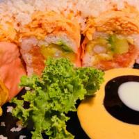 Angry Dragon Roll · Shrimp tempura, spicy tuna and avocado inside, wrapped with soy paper, spicy crab on the top...