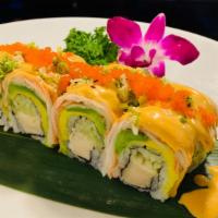 King Roll · White tuna, cucumber inside. Topped with double layers of avo and kani.