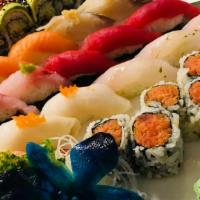 Sushi (For 2) · 18 pieces of sushi, spicy tuna roll, and green dragon roll. If you have a food allergy, plea...
