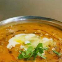 Daal Makhani · Slow cooked lentil flavored with ghee and Indian spices.