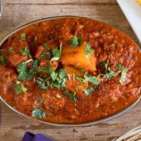 Lamb Vindaloo · Lamb cooked in spicy Kashmiri chilly sauce with potatoes.