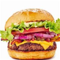 Boheme Burger · All natural beef patty, chili oil, 1000 island, smoked cheddar, fast food fries & secret sau...