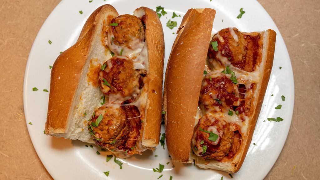 Meatball Or Sausage Parmigiana · 