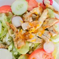 Grilled Caesar Chicken Salad · Romaine lettuce, croutons, parmesan cheese, and Caesar dressing.
