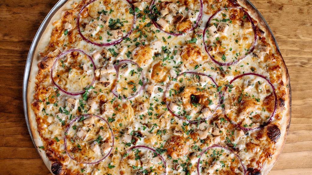 Bbq Chicken Pizza · BBQ Sauce, smoked gouda, mozzarella, grilled chicken, red onion, and cilantro.