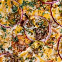 Mexican Pizza · Roma Tomatoes, Hamburger, Red Onion, Jalapeños, Poblanos, Cheddar and Cilantro