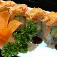 Yummy Yummy Roll · Shrimp tempura and avocado topped with spicy kani and special sauce.