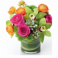 Mood Changer Vase Arrangement · Stunning hot pink roses are arranged with exotic green cymbidium blooms and mixed with orang...