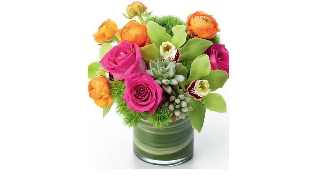 Mood Changer Vase Arrangement · Stunning hot pink roses are arranged with exotic green cymbidium blooms and mixed with orange mini roses and long lasting succulent cuts.  Arranged in a leaf lined glass cylinder, this floral arrangement makes a perfect gift for any occasion.