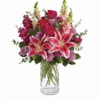 Bold & Beautiful - Standard · Bold and Beautiful, this stunning arrangement features pink roses, stargazer lilies, purple ...