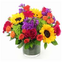 Bright As Day - Standard · Featuring emerald green Hydrangea, California Sunflowers, pink South American Roses, purple ...