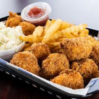 Fried Cod Nuggets · Hand breaded nuggets, served with two sides and hush puppies.