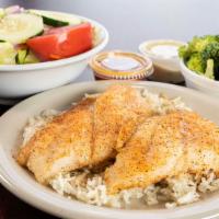 Baked Cod Fish · Seasoned on a bed of white rice and two sides.