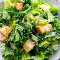 Kale Caesar Salad · Served with focaccia croutons and Parmesan cheese. Add chicken, steak, smoked salmon, or cra...