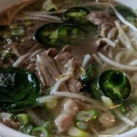 Pho Saigon · The Works! Beef noodle soup served with thinly sliced eye of round, brisket, flank, fatty br...