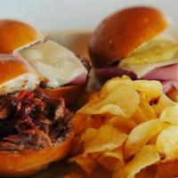 3-Peat Sliders · BBQ pulled pork, ham and Swiss with hot bacon honey mustard, Cuban on brioche roll.