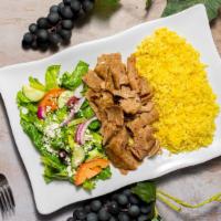 Gyros Plate · Top menu item. A large portion of strips of meat made of minced lamb and beef. Served with r...
