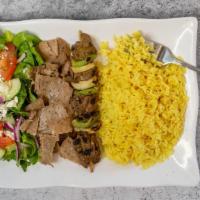 Greek Combination Plate Kabob · Choose a skewer of chicken or souvlaki, and large portion of gyros meat with yellow rice. Se...