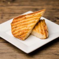 Garlic Bread · Italian bread, lightly toasted and served with garlic infused butter. For the cheese lovers ...