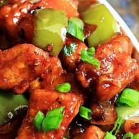 Chilli Paneer · Paneer cooked in a chili sauce with onions, peppers and tomato.
