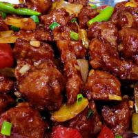 Chilly Chicken  · Stir fry chicken breast with garlic ginger and bell peppers