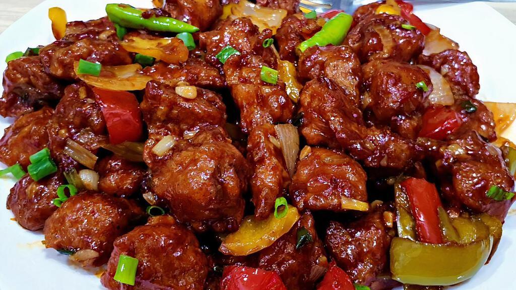 Chilly Chicken  · Stir fry chicken breast with garlic ginger and bell peppers