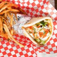 Gyro Wrap · Ground lamb and beef w/ cucumbers, tomatoes, garlic and hot sauce wrapped in a pita bread se...