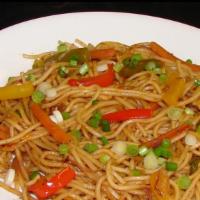 Veg Noodles  · Stir fry noodles with bell peepers cabbage  red onion finish with green onion