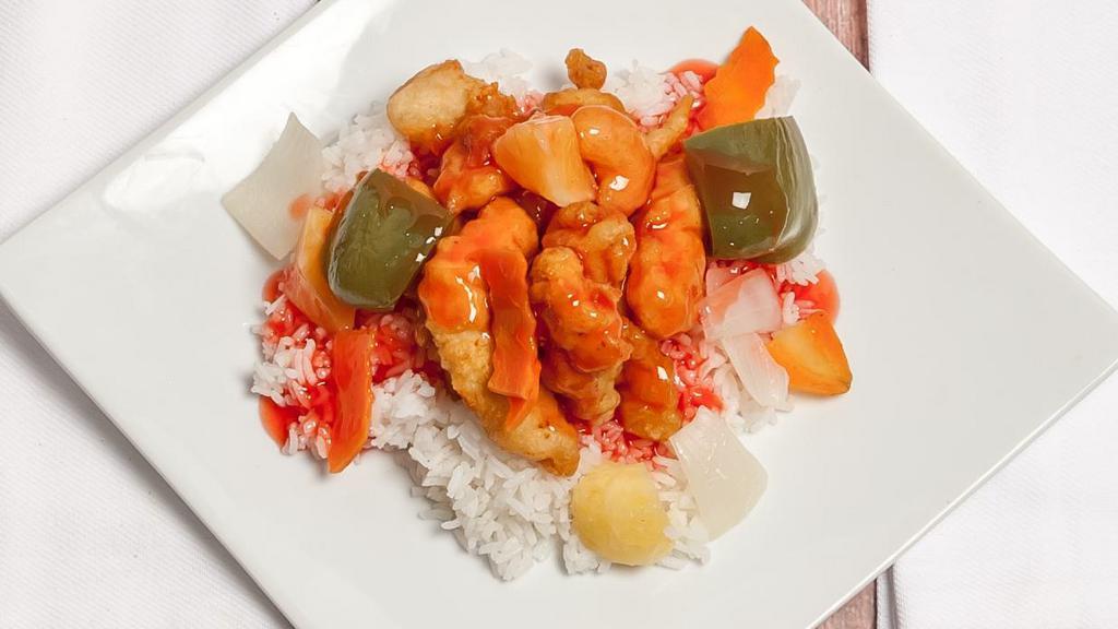 #45. Sweet And Sour Chicken · With breaded, deep fried chicken breast in sweet and sour sauce with steamed pineapple, green pepper, white onion, carrots, served with sweet sauce on the side.